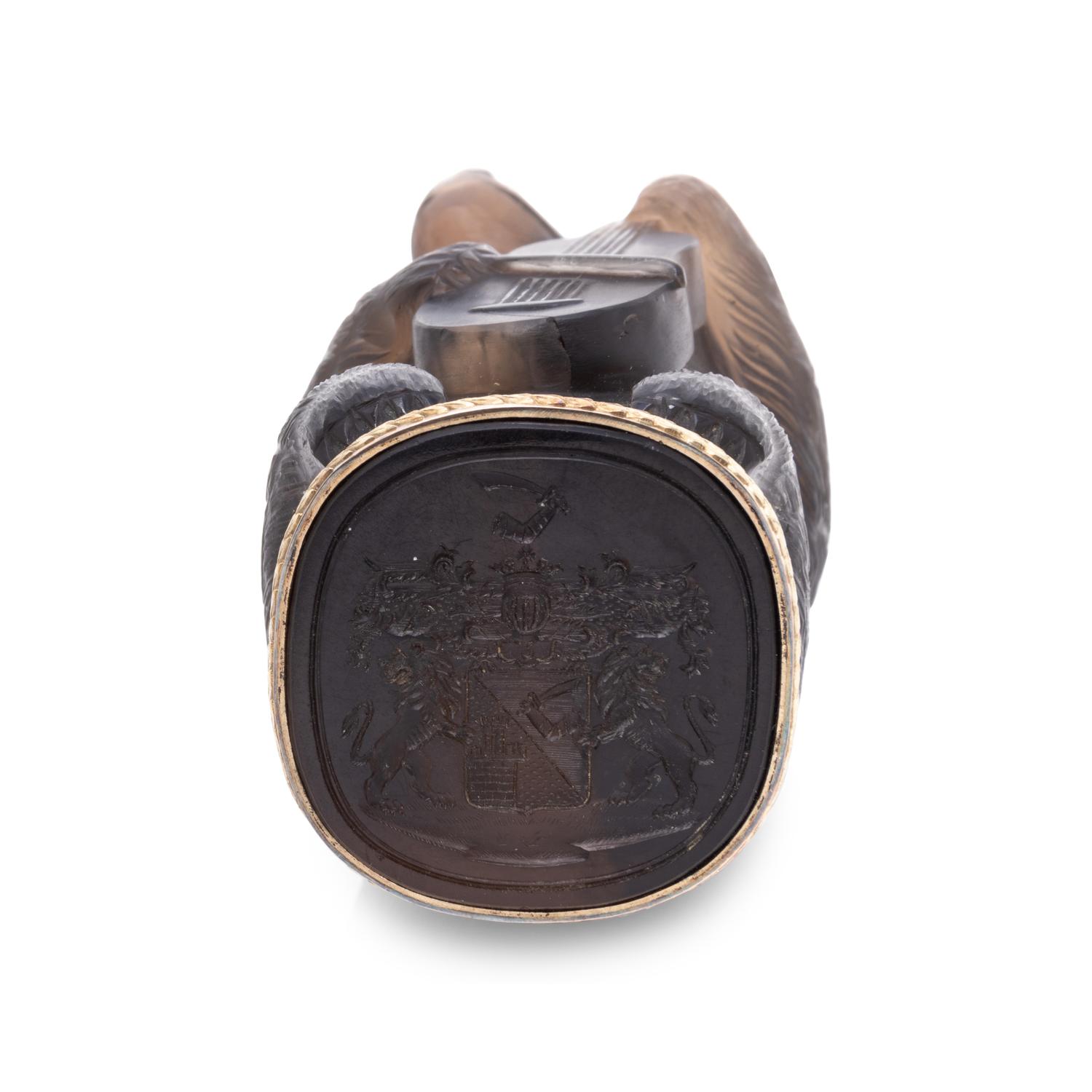 A Gold and Diamond Mounted Carved Hardstone Hand-Seal