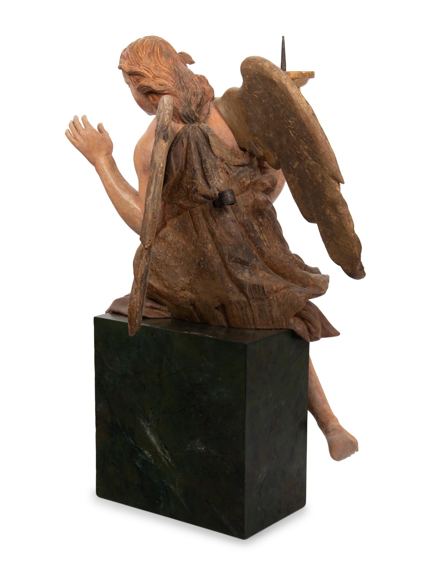 An Italian Carved and Polychrome Figural Torchère