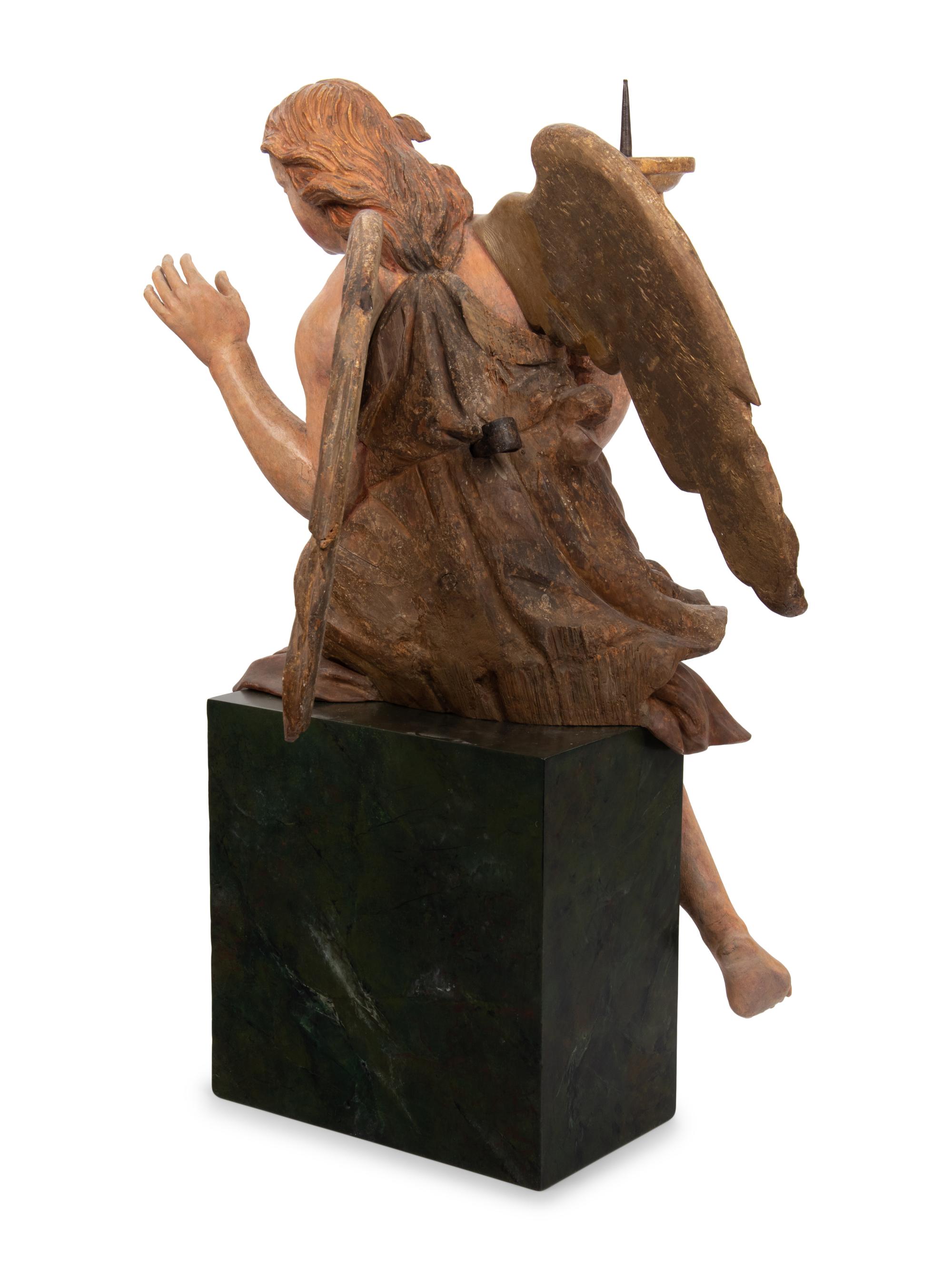An Italian Carved and Polychrome Figural Torchère