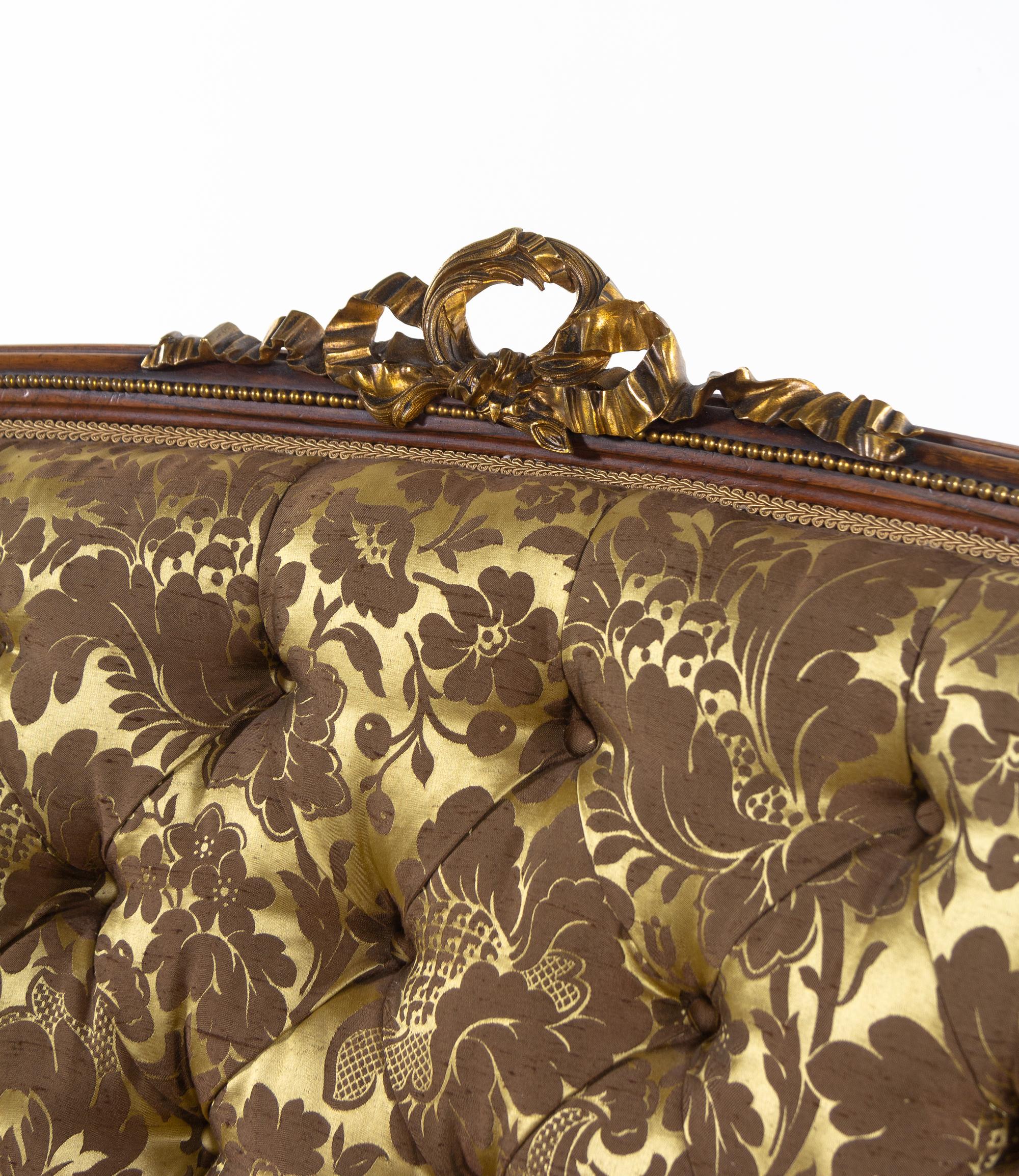 A Louis XV Style Gilt Bronze Mounted Rosewood Three-Piece Salon Suite