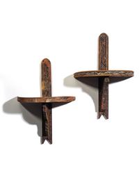 A Pair of Painted Wood Brackets