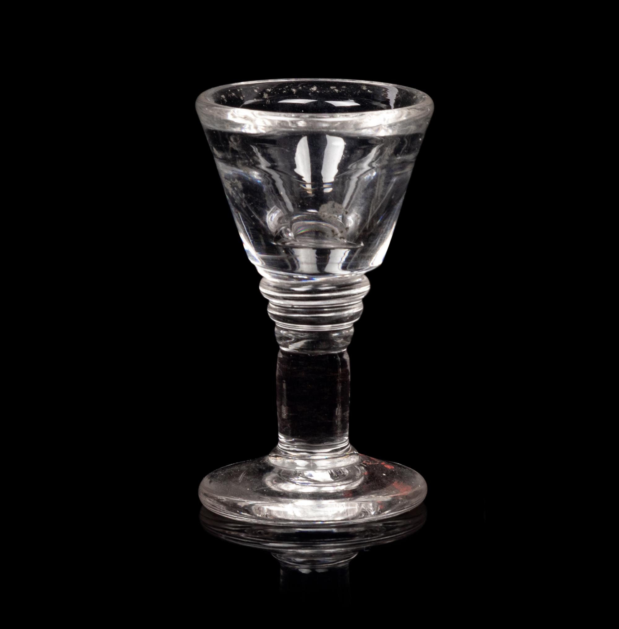 A Group of Three English Wine Stems and an American Wine Stem