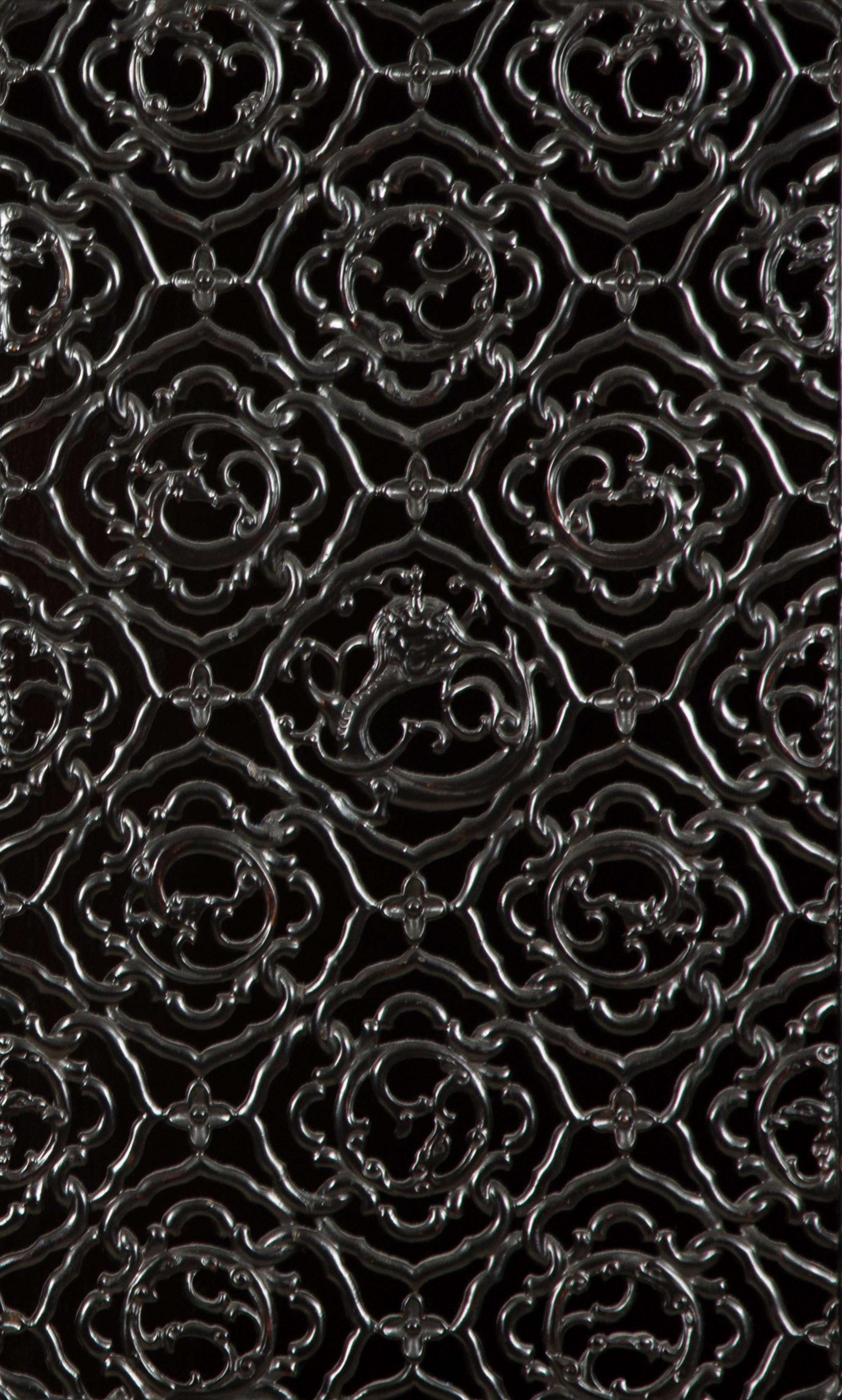 A Chinese Black Lacquer Cabinet with Pierce-carved Upper Door Panels