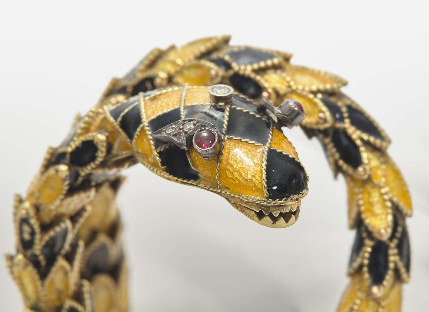 A Yellow Gold, Enamel, and Gemstone Snake Bracelet