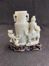 A Chinese jade "Boys, Kylin and Phoenix" vase on carved wood stand 玉雕童子凤鸟花樽及底座
