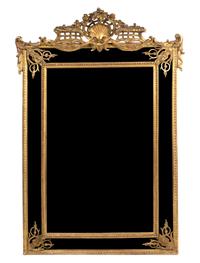 A Regence Style Giltwood Mirror, Height approximately 75 x width 48 inches.