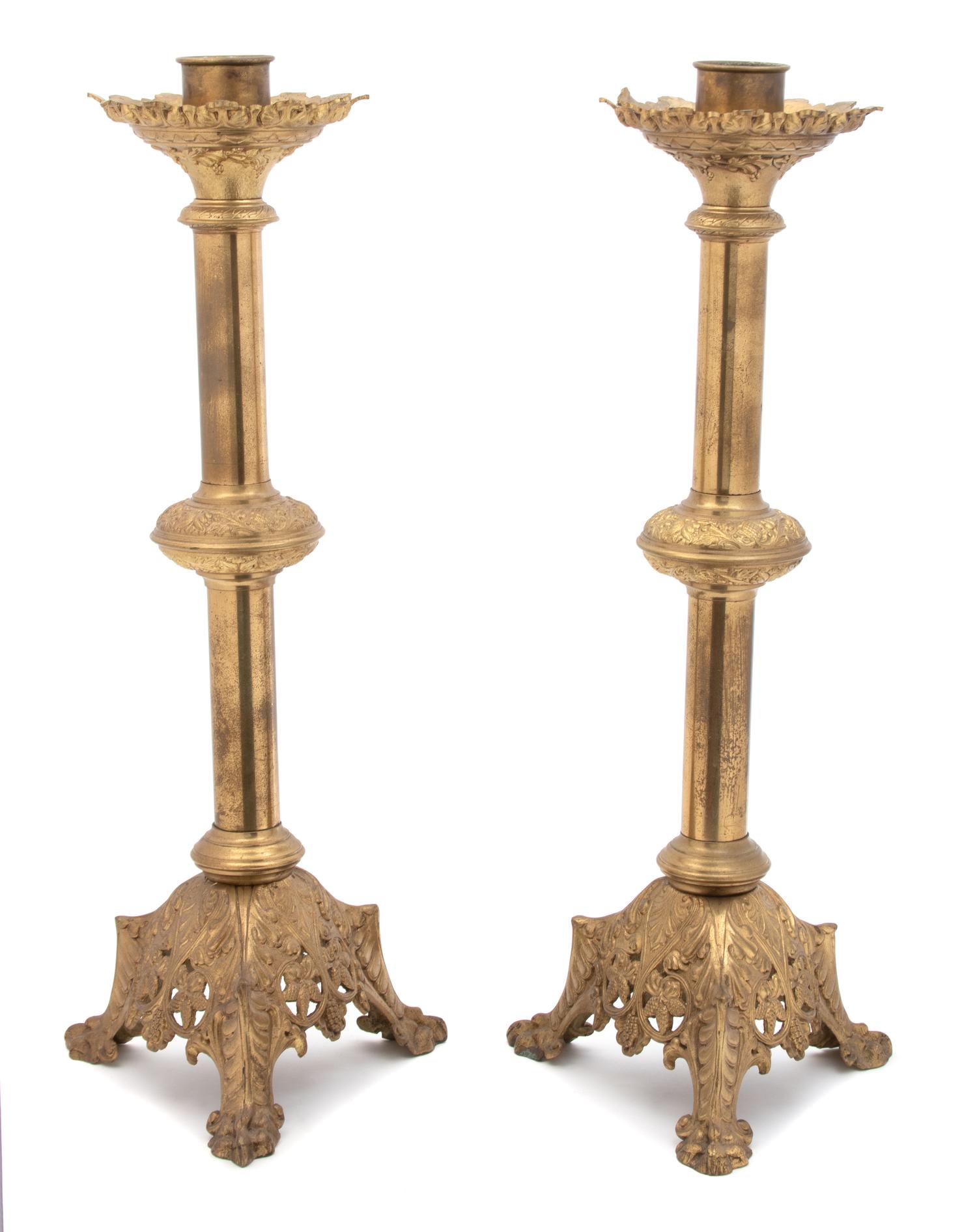 A Pair of Continental Molded Brass Torcheres Height 24 3/4 inches. — 19TH CENTURY