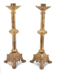 A Pair of Continental Molded Brass Torcheres Height 24 3/4 inches. — 19TH CENTURY