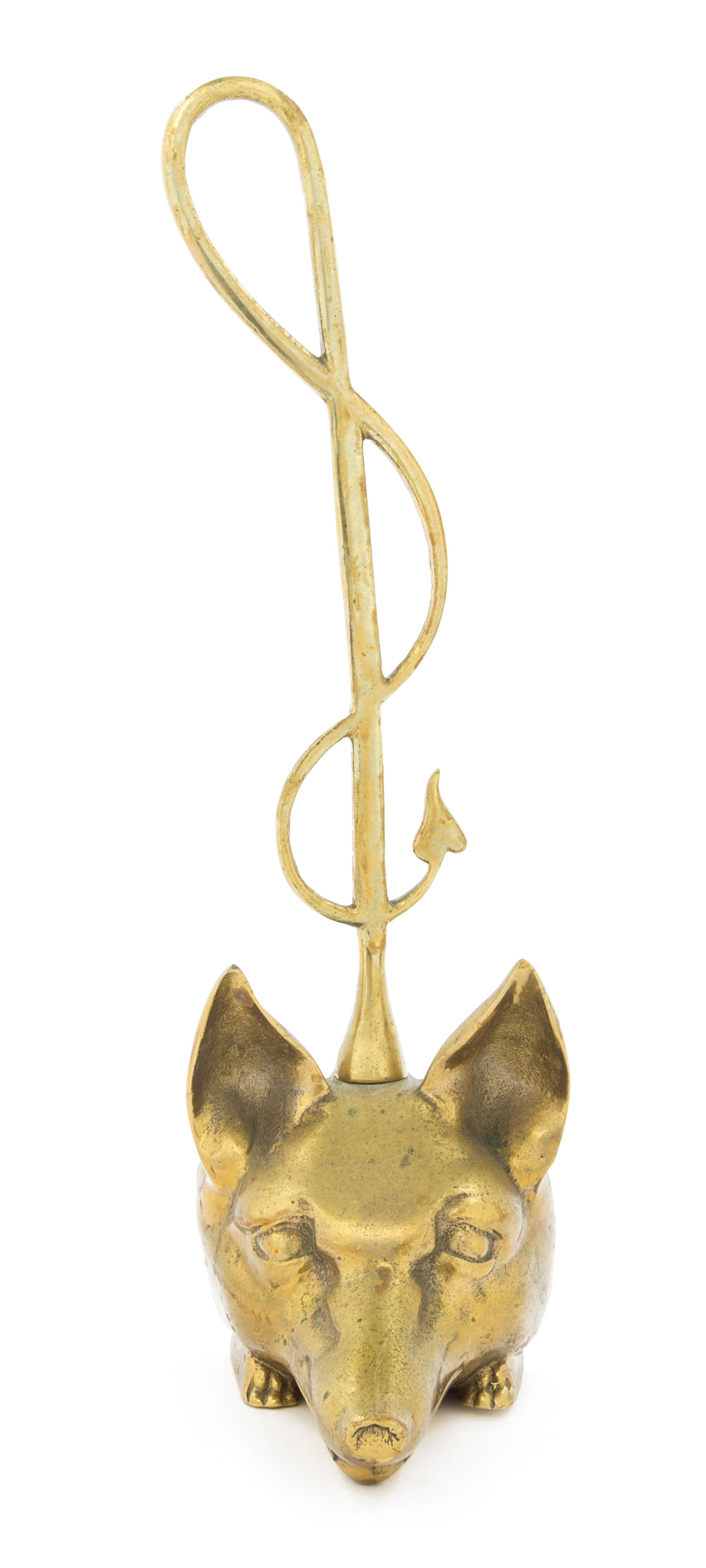 A Gilt Metal Doorstop Height 15 1/2 inches.