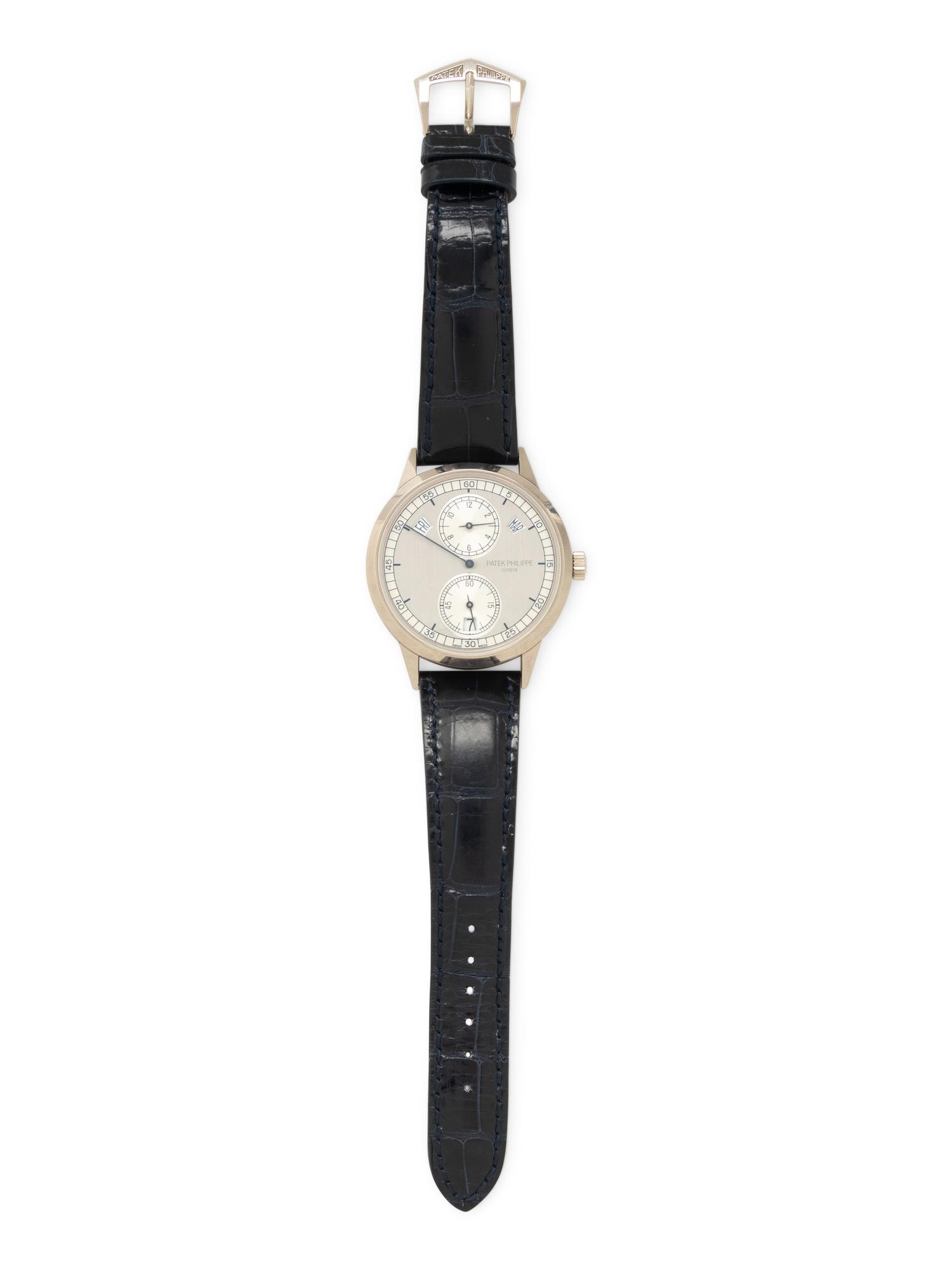 PATEK PHILIPPE, REF. 5235G 18K WHITE GOLD ANNUAL CALENDAR 'REGULATOR' WATCH