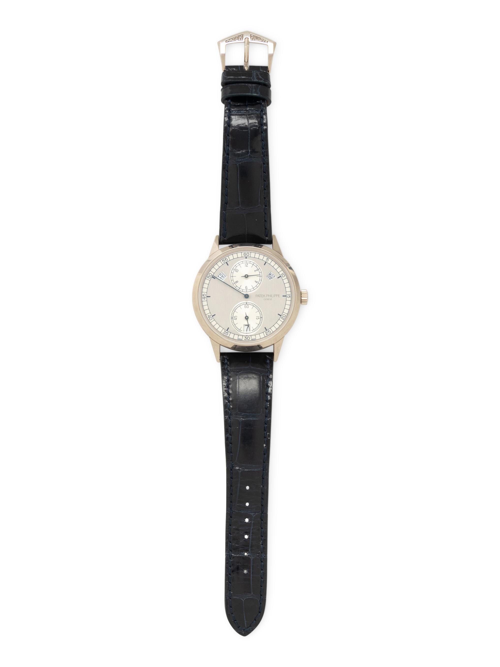 PATEK PHILIPPE, REF. 5235G 18K WHITE GOLD ANNUAL CALENDAR 'REGULATOR' WATCH
