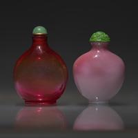 Two Chinese Glass Snuff Bottles, Qing Dynasty, 18th Century — 清中期 寶石紅料及粉紅夾白料素面鼻煙壺兩支