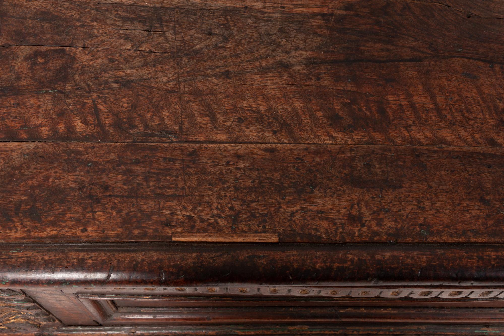 A Spanish Parcel Gilt Carved Walnut Chest