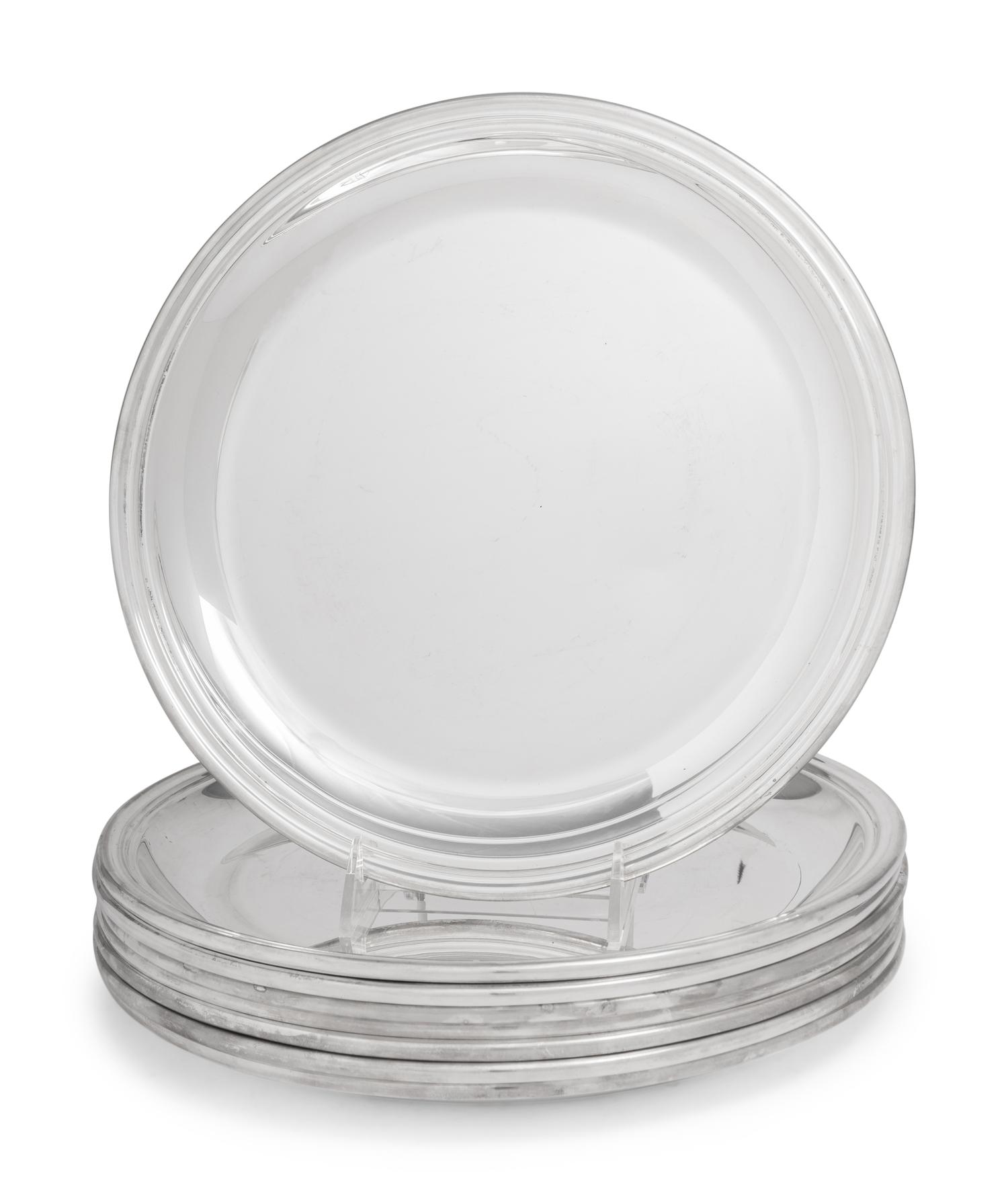 A Set of Eight Puiforcat Silver-Plate Chargers