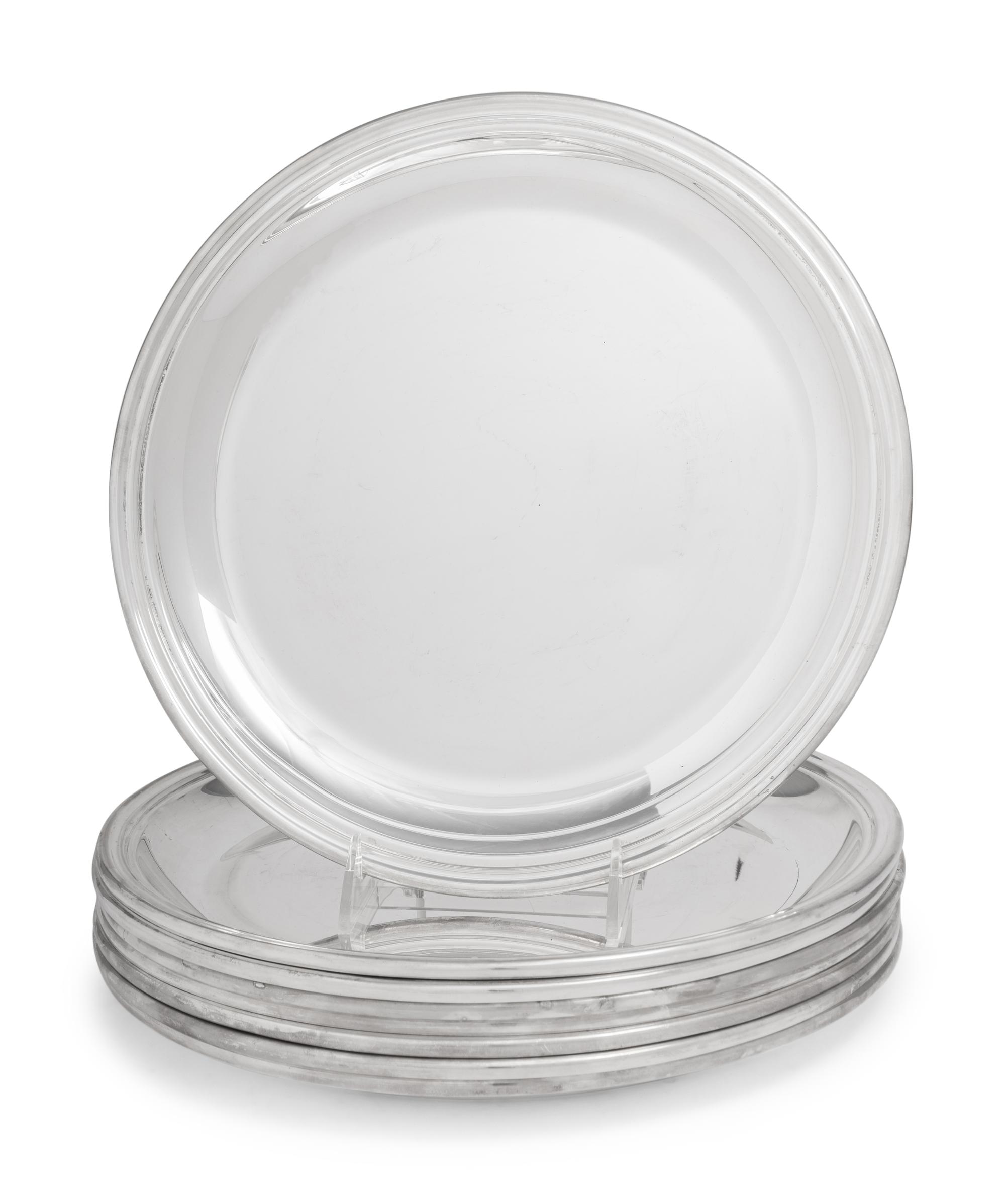 A Set of Eight Puiforcat Silver-Plate Chargers