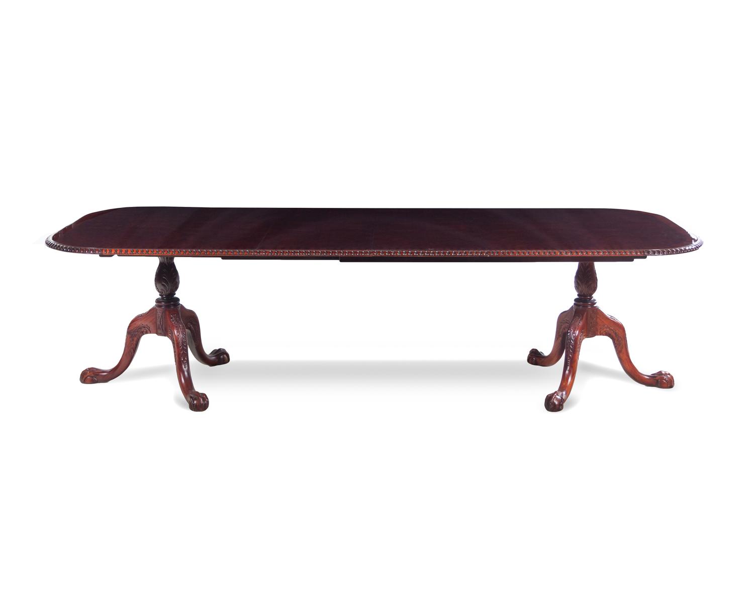 A Queen Anne Style Mahogany Double-Pedestal Dining Table