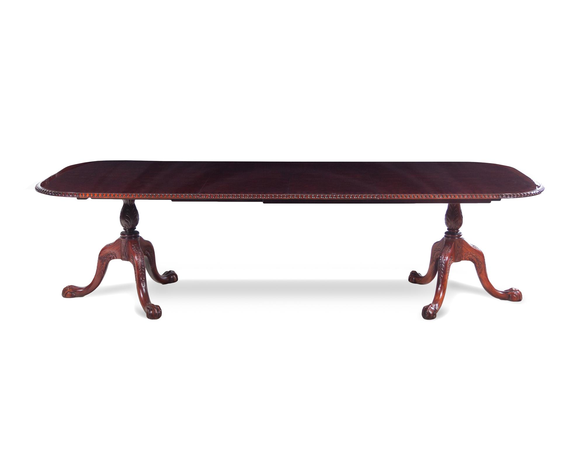 A Queen Anne Style Mahogany Double-Pedestal Dining Table