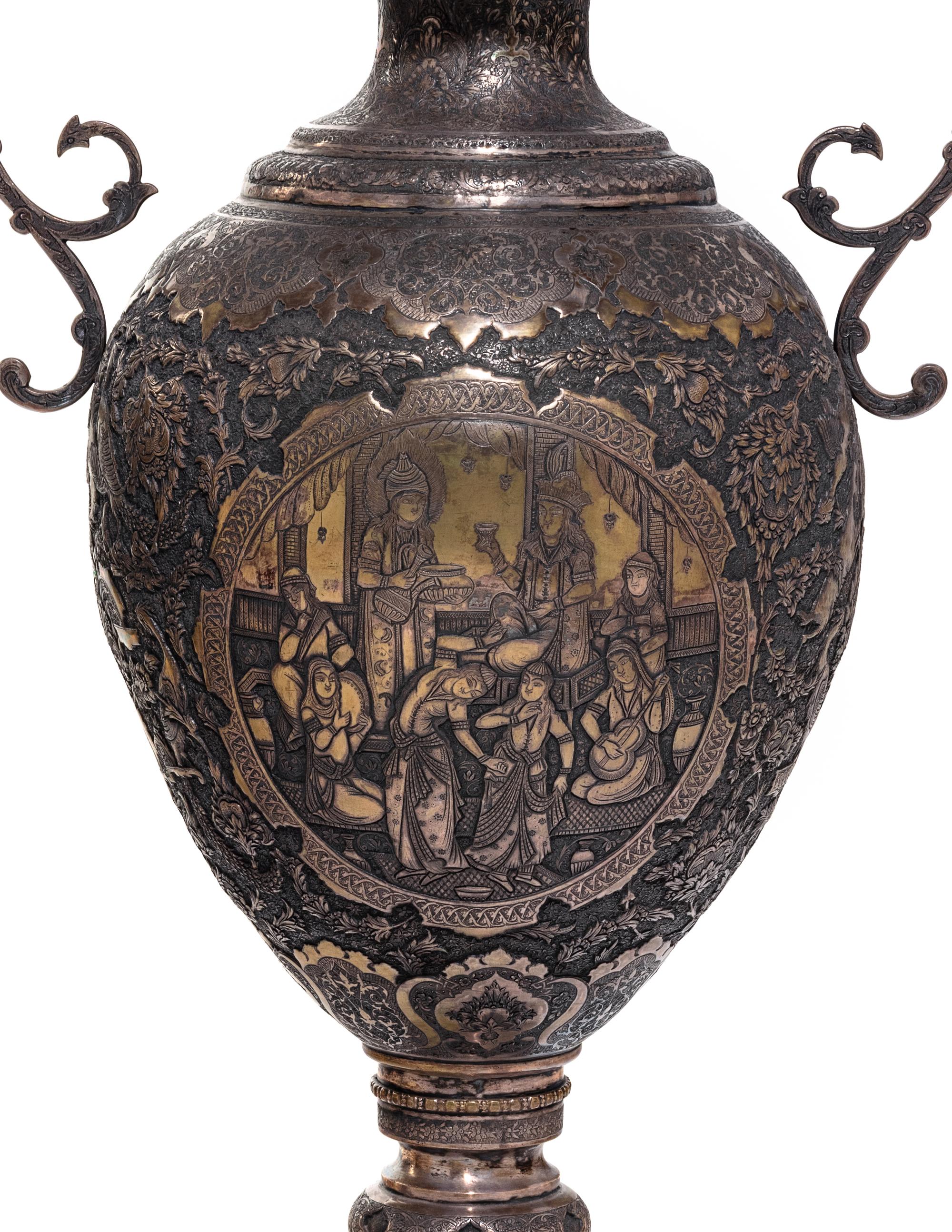 A Pair of Persian Silvered Copper Vases