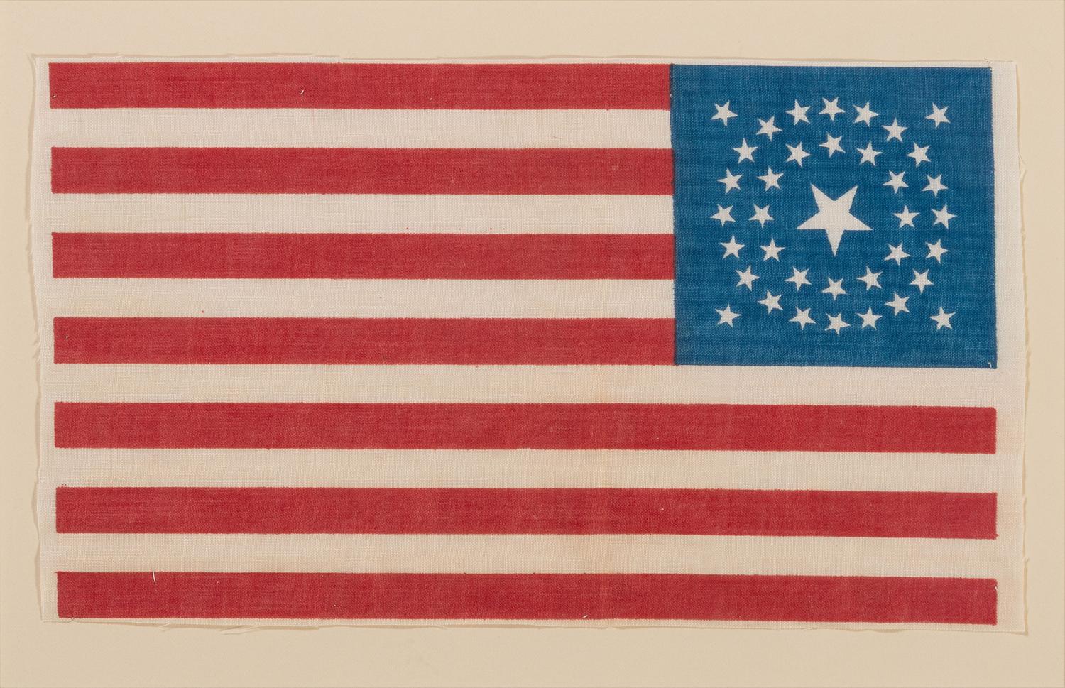[FLAGS]. 37-star American parade flag with double-medallion configuration. Ca 1867-1876.