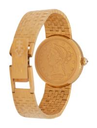 CORUM, 18K YELLOW GOLD US $5 COIN WRISTWATCH