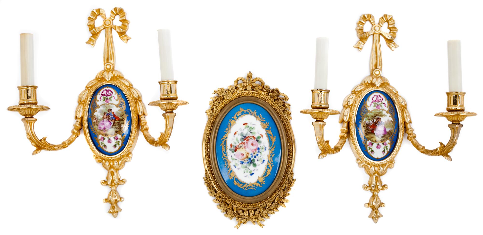 A Painted Porcelain Plaque Height of plaque overall 11 1/2 inches.