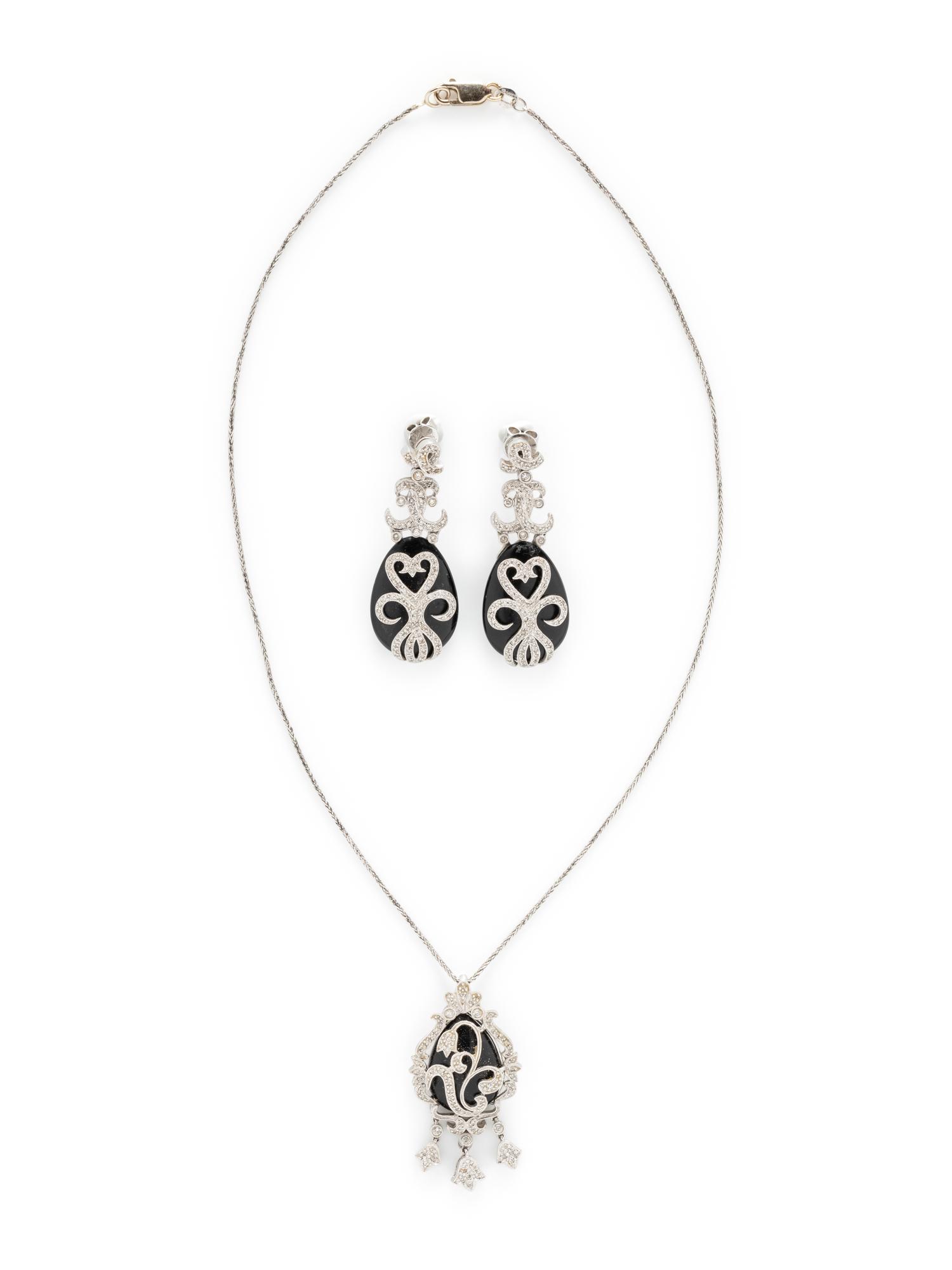 WHITE GOLD, DIAMOND, AND BLACK HARDSTONE DEMI PARURE