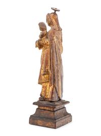 A Continental Carved and Gilt Decorated Santo Figure