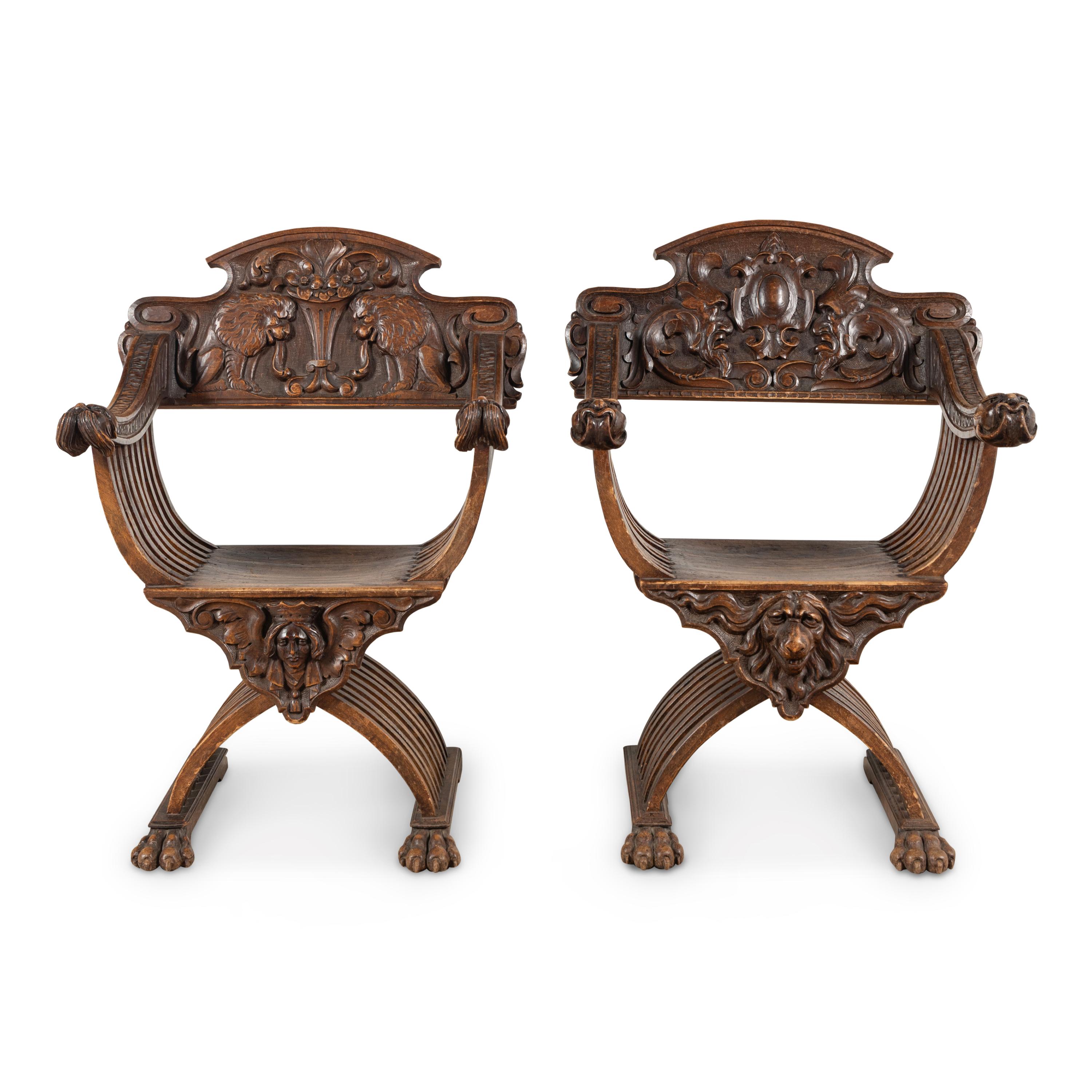 A Pair of Italian Carved Walnut Savonarola Chairs