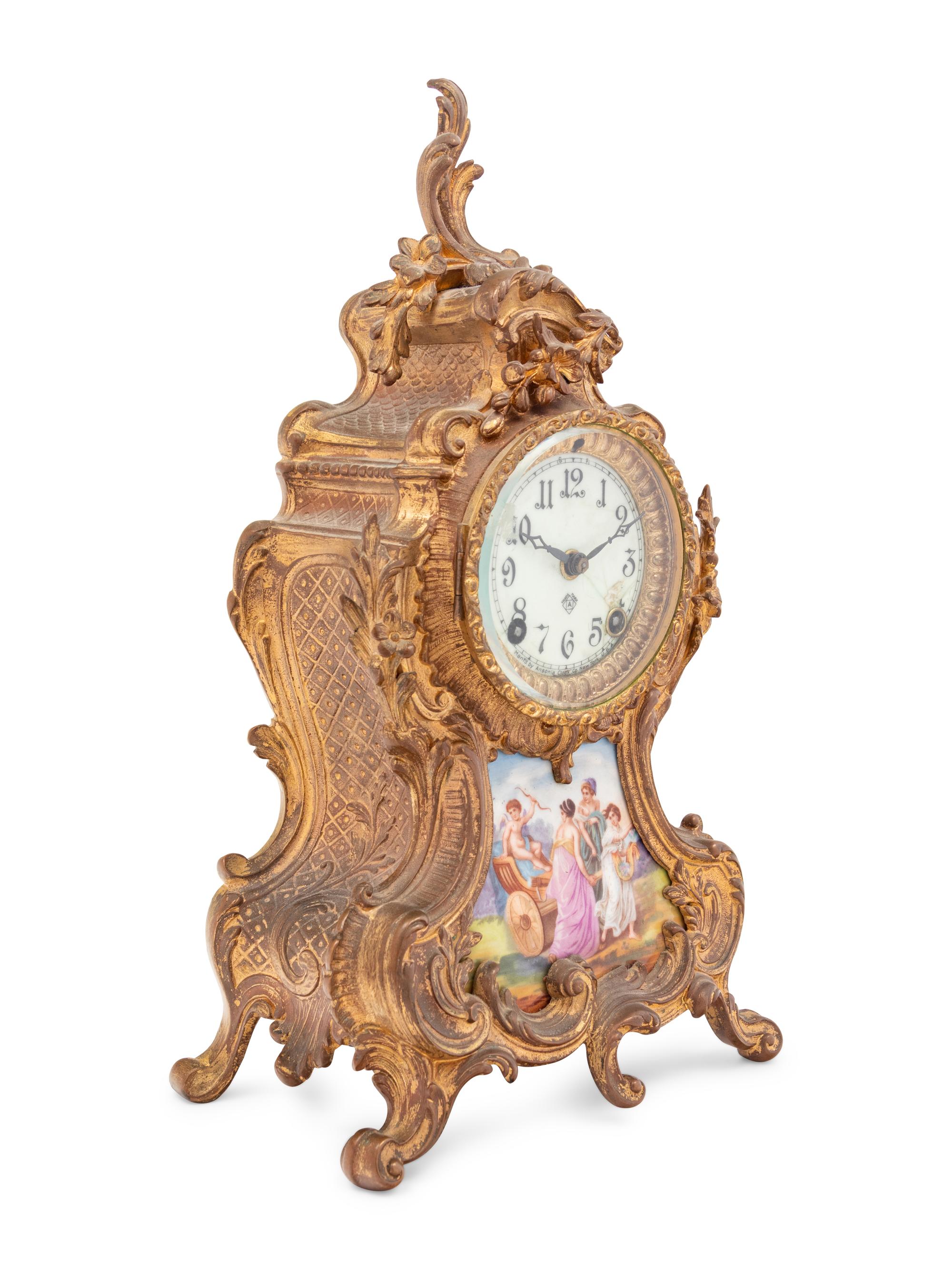 An Ansonia Porcelain and Gilt Metal Mantel Clock in the Louis XV Taste