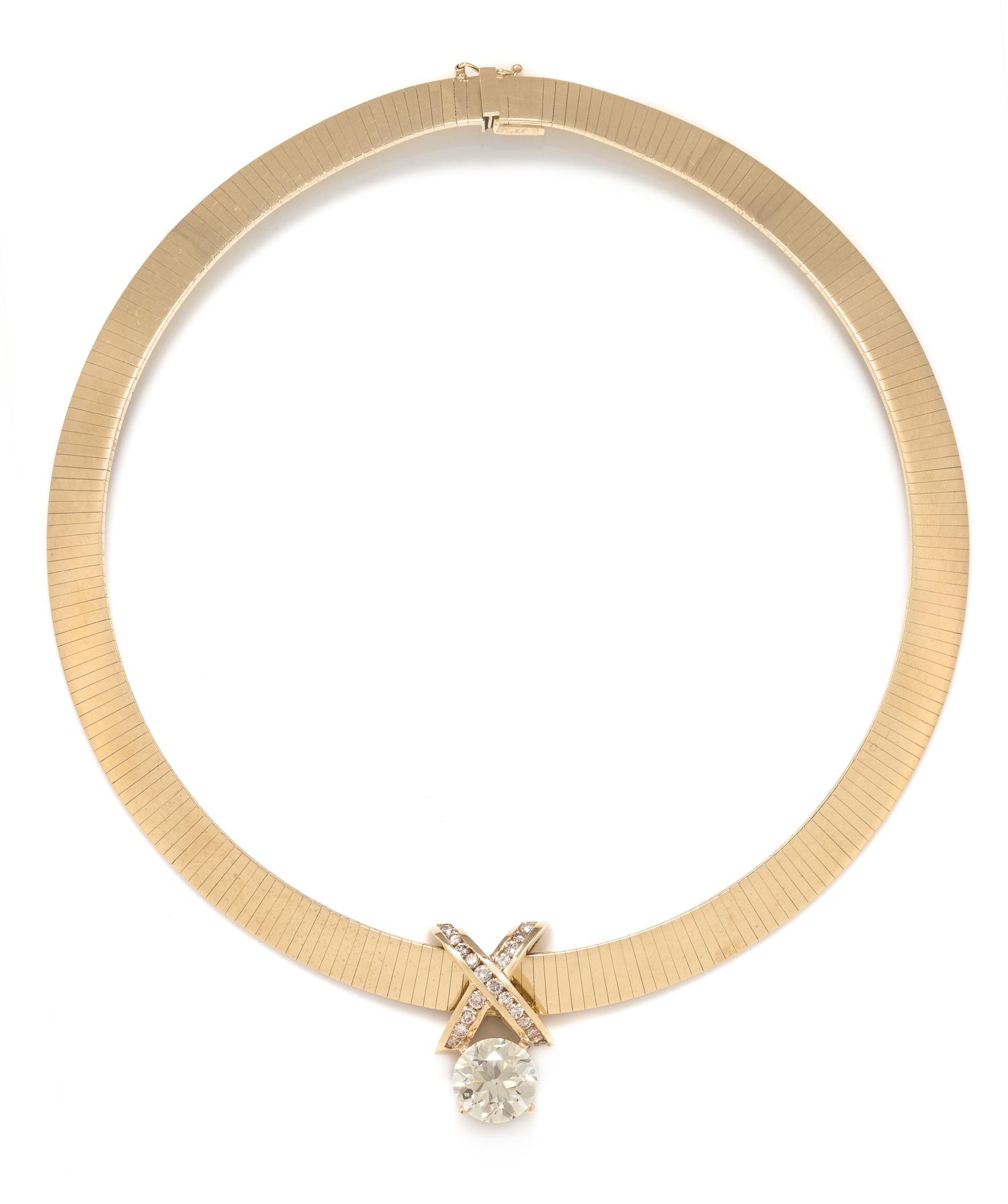 A 14 Karat Yellow Gold and Diamond Pendant/Necklace,