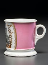 A Porcelain Shaving Mug Depicting A Steam Pump