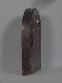 A Carved Walnut Ship Board Panel of a Sailor