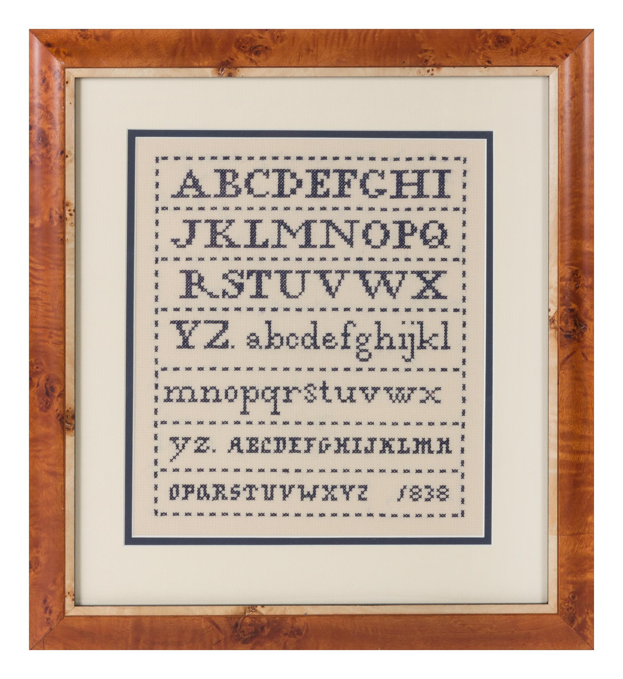 An American Needlepoint Sampler 10 x 8 1/2 inches. — 20TH CENTURY