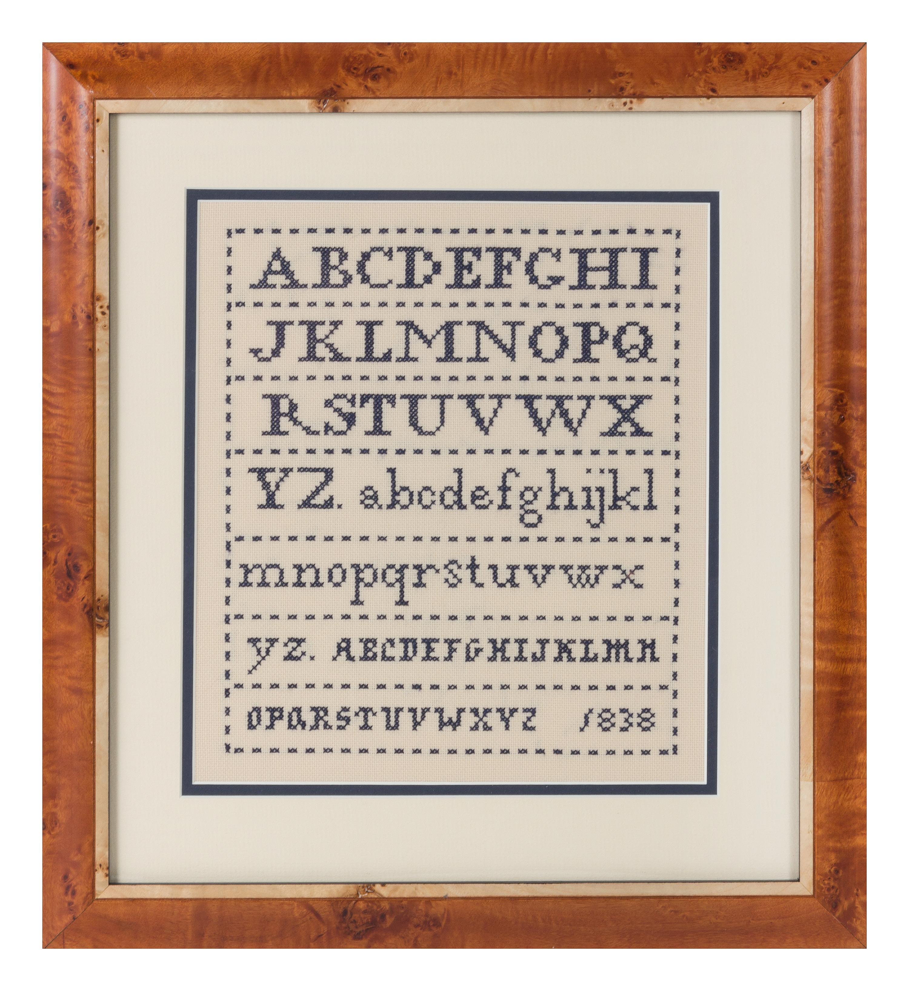 An American Needlepoint Sampler 10 x 8 1/2 inches. — 20TH CENTURY
