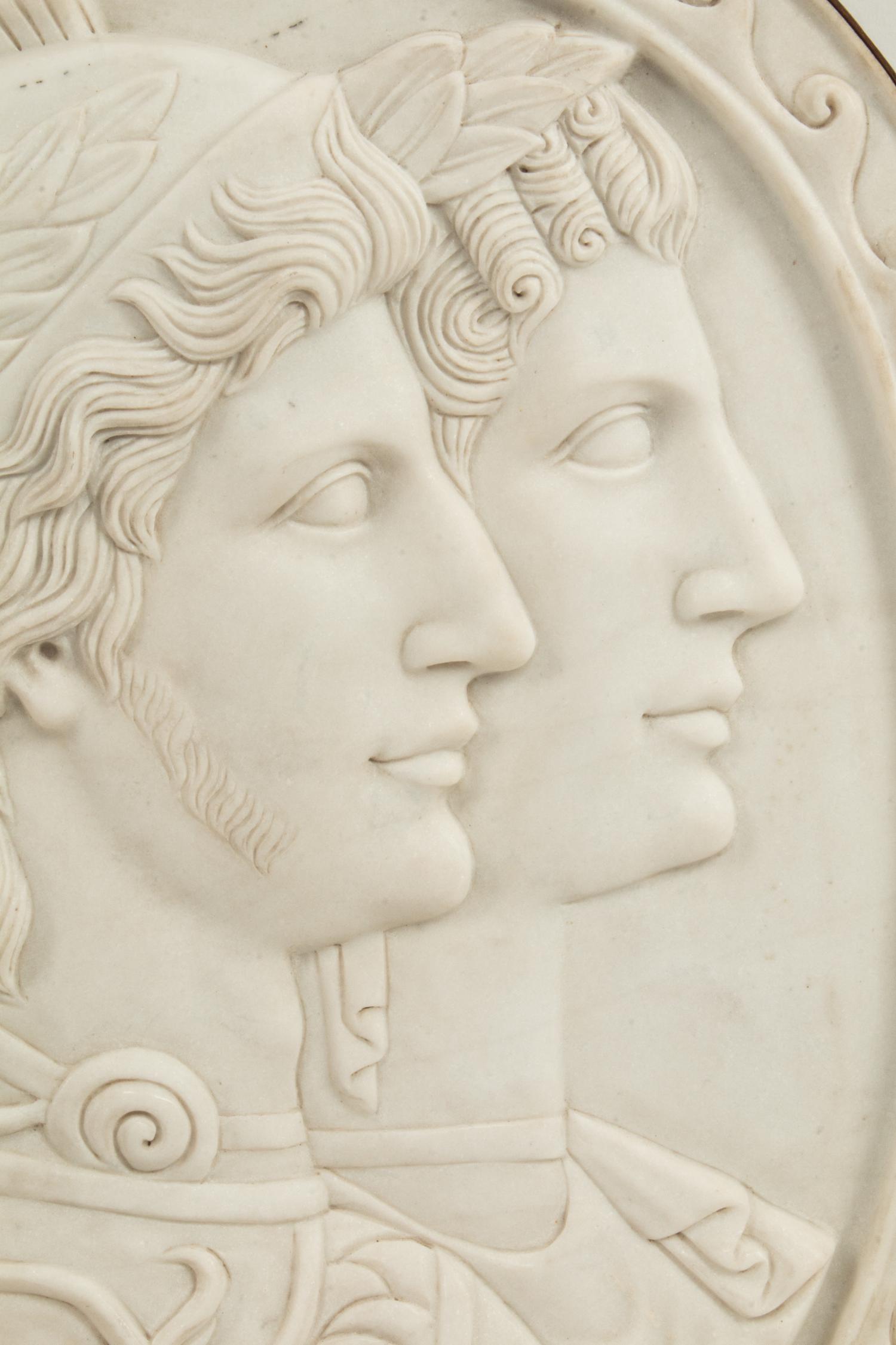 An Italian Iron-Mounted Marble Profile Medallion