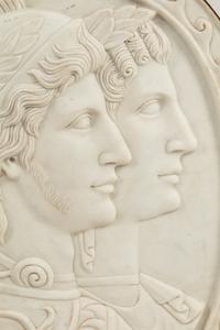An Italian Iron-Mounted Marble Profile Medallion