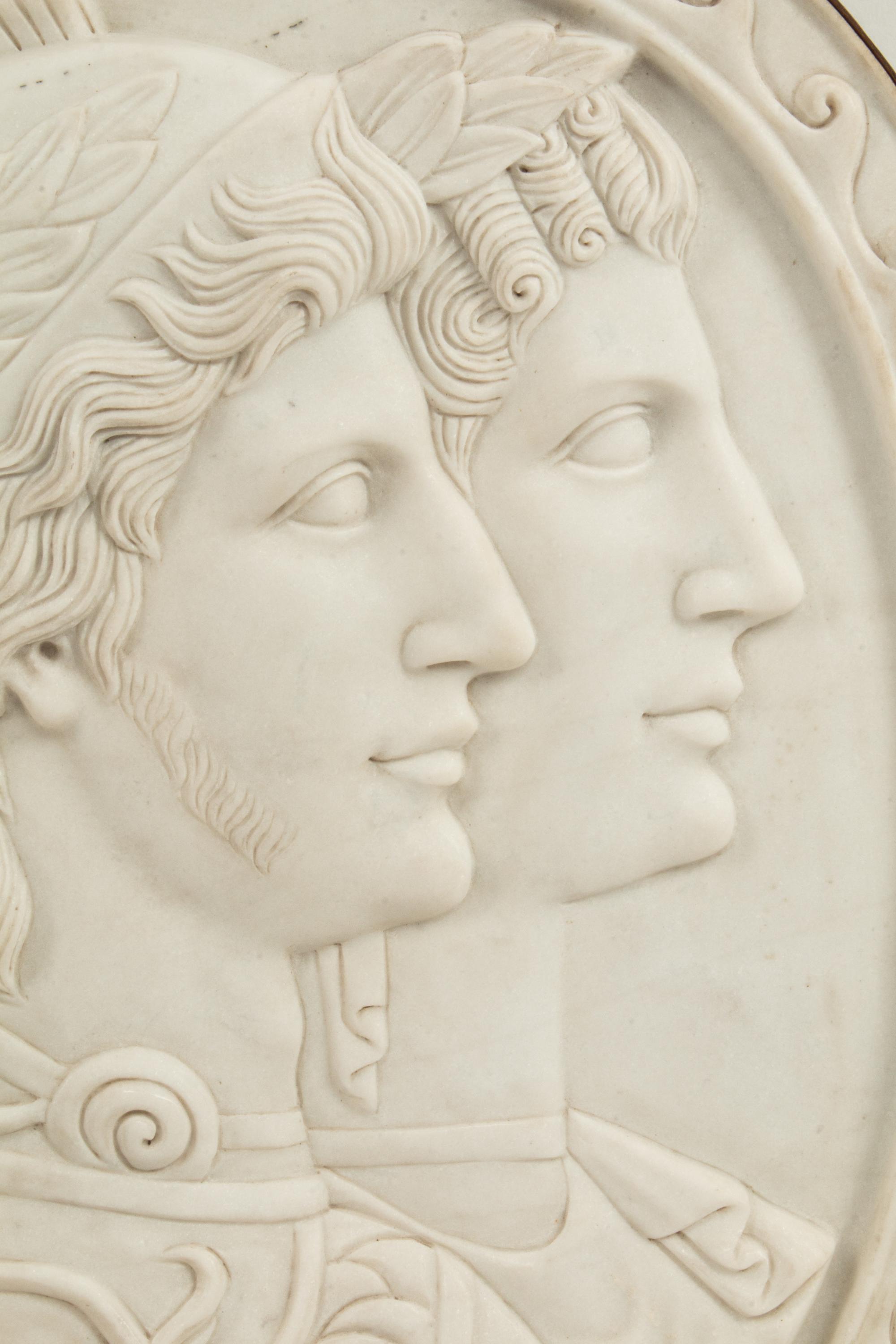 An Italian Iron-Mounted Marble Profile Medallion