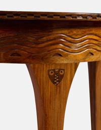An Austrian Secessionist Inlaid Dining Suite, comprising a sideboard, a server, an extension dining table with five leaves, six side chairs and four armchairs