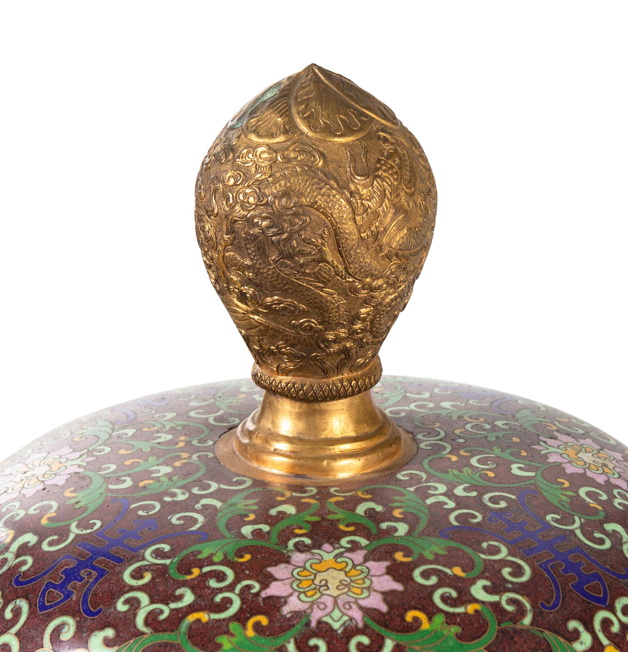 A Large Chinese Cloisonné Enamel Covered Jar and A Hardwood Stand