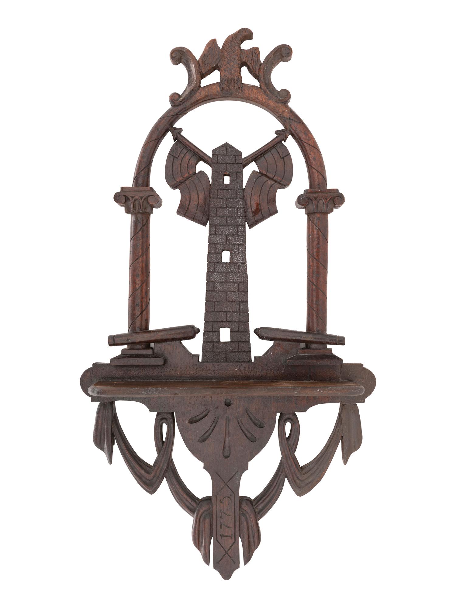 [AMERICANA]. Folk art carved patriotic shelf featuring eagle and cannon.
