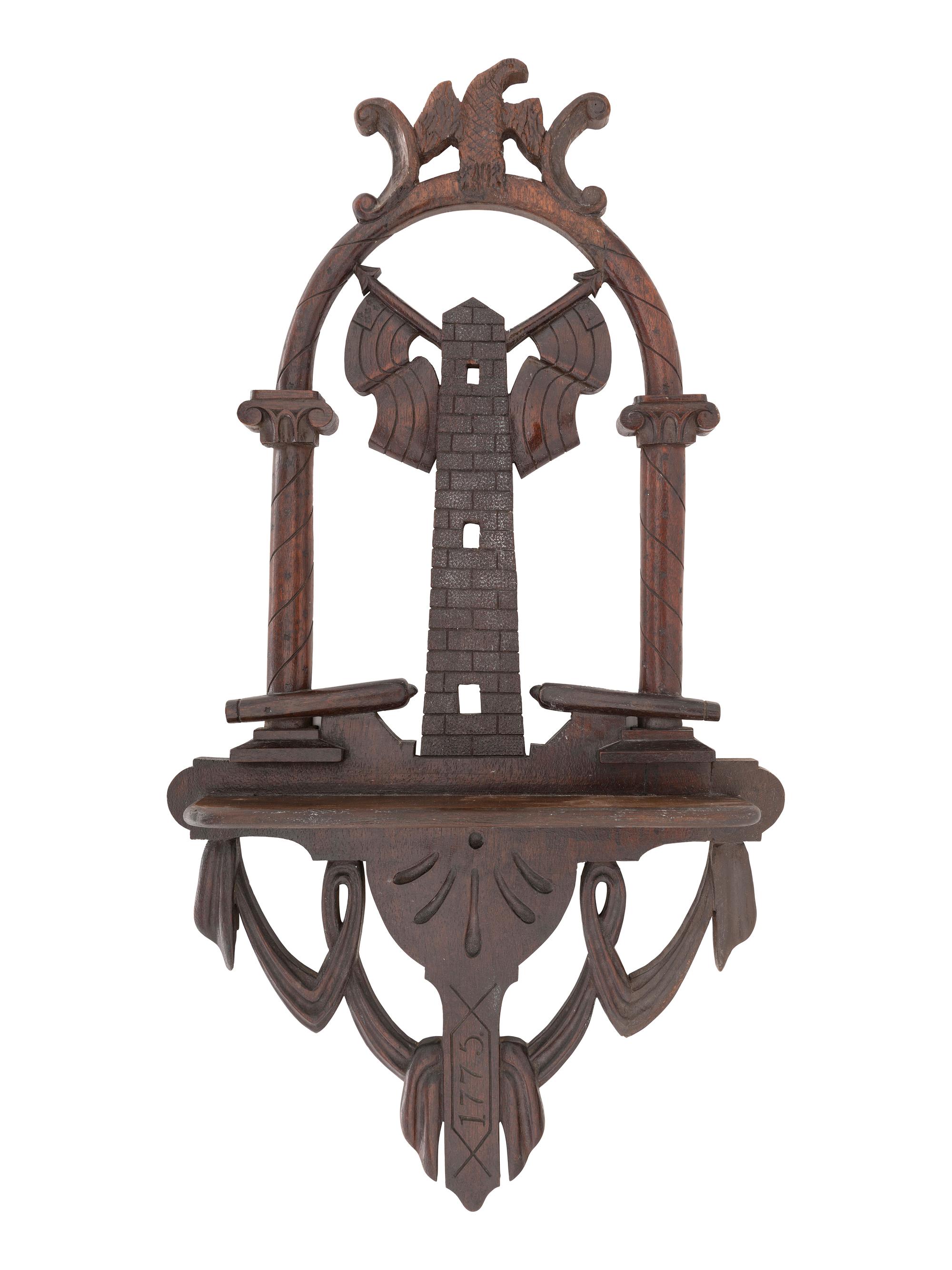 [AMERICANA]. Folk art carved patriotic shelf featuring eagle and cannon.