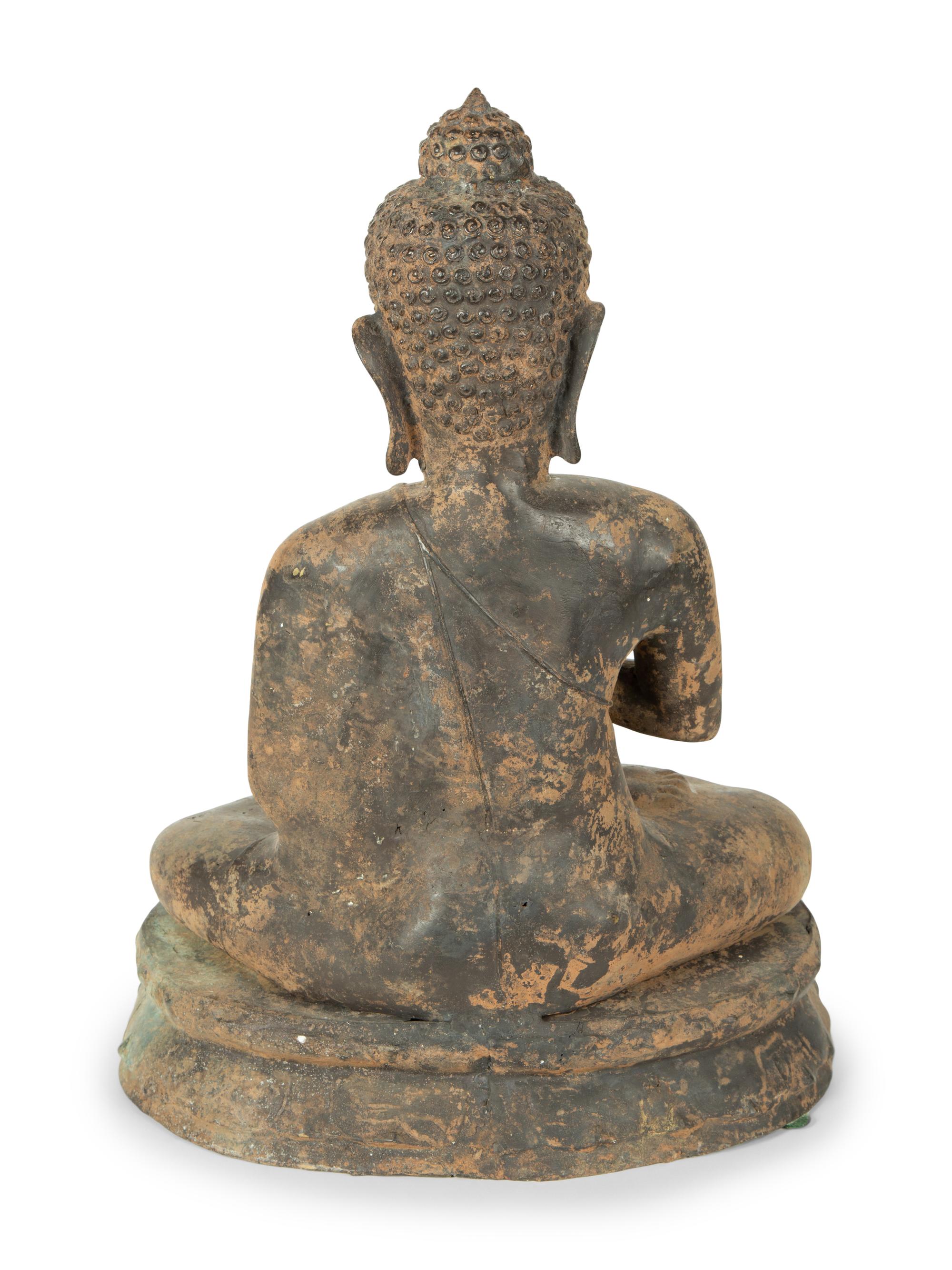 A Patinated Bronze Seated Buddha