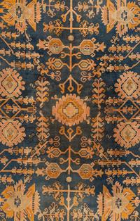 An Oushak Wool Rug
