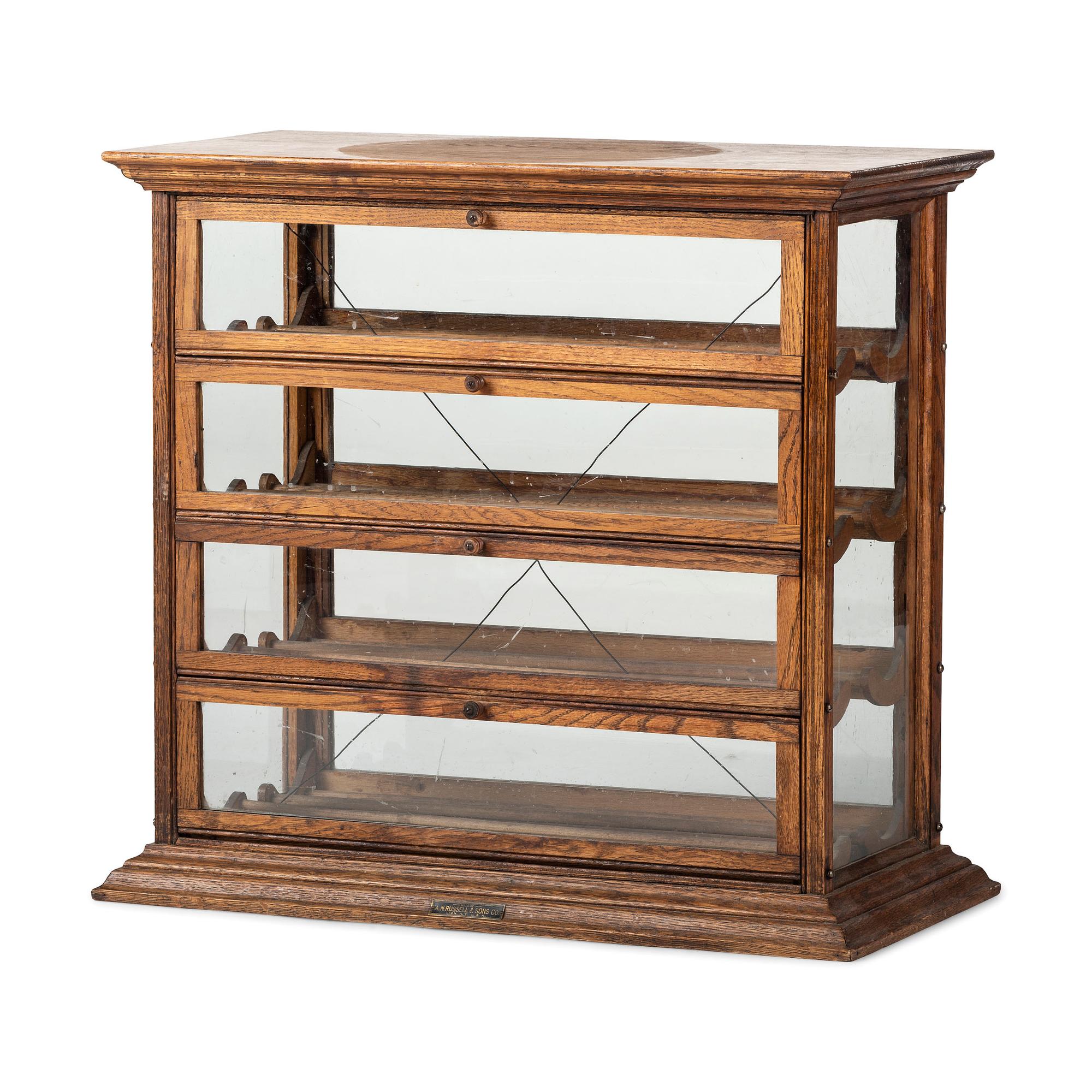 A Showcase Spool Cabinet