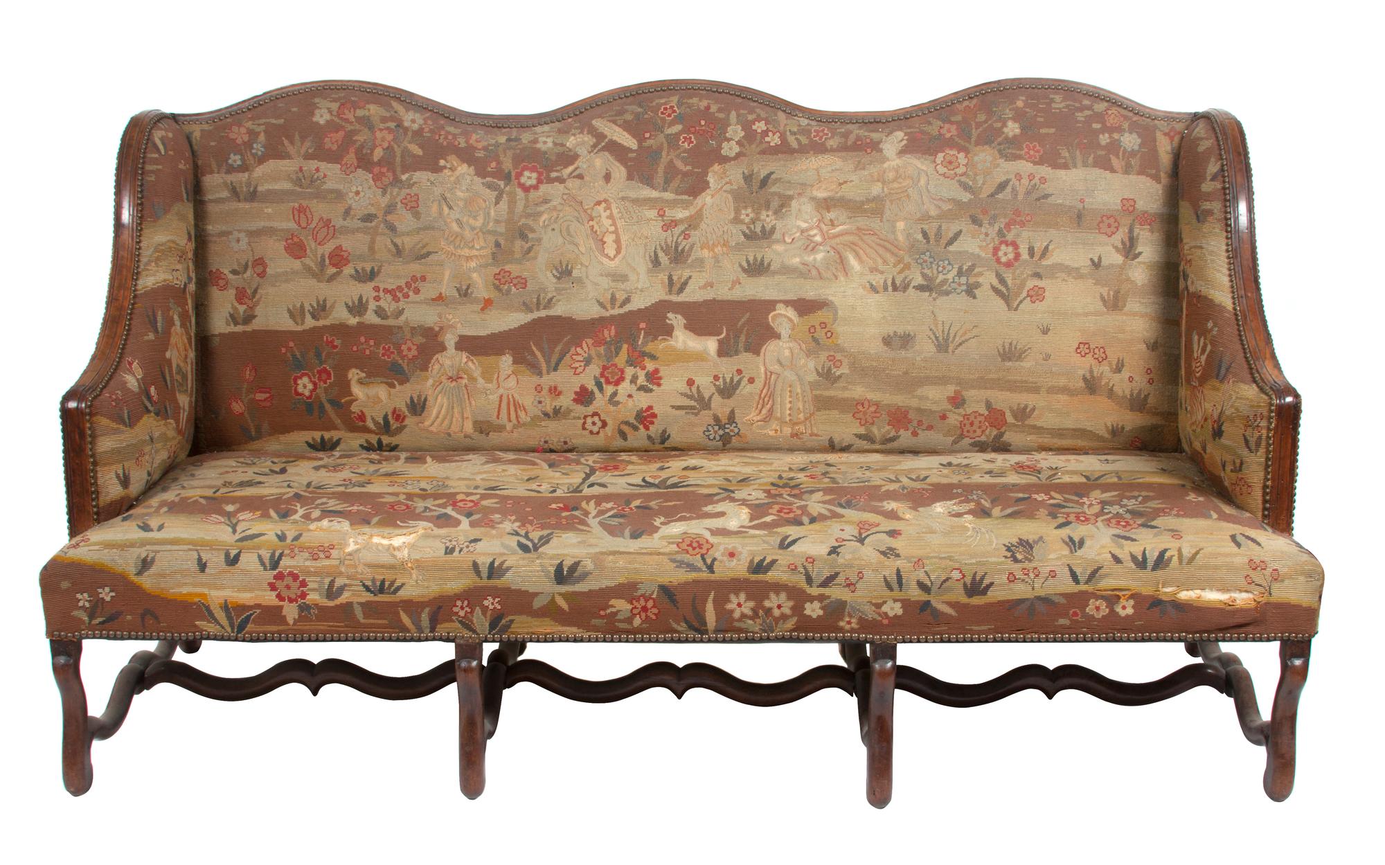 A Victorian Tapestry Upholstered Wing-Back Settee Height 40 x width 77 x depth 34 inches.