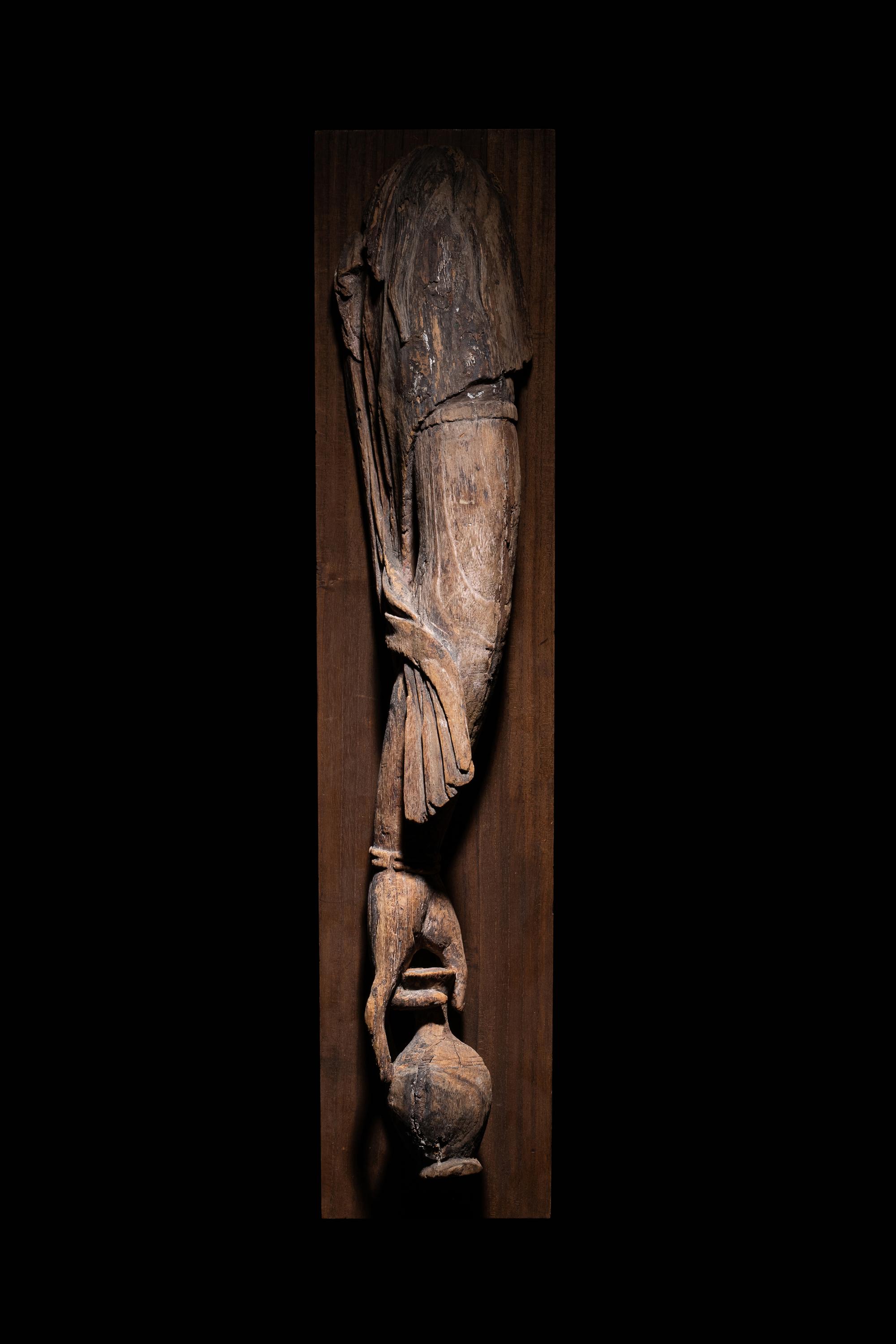 A Carved Wood Arm of Guanyin