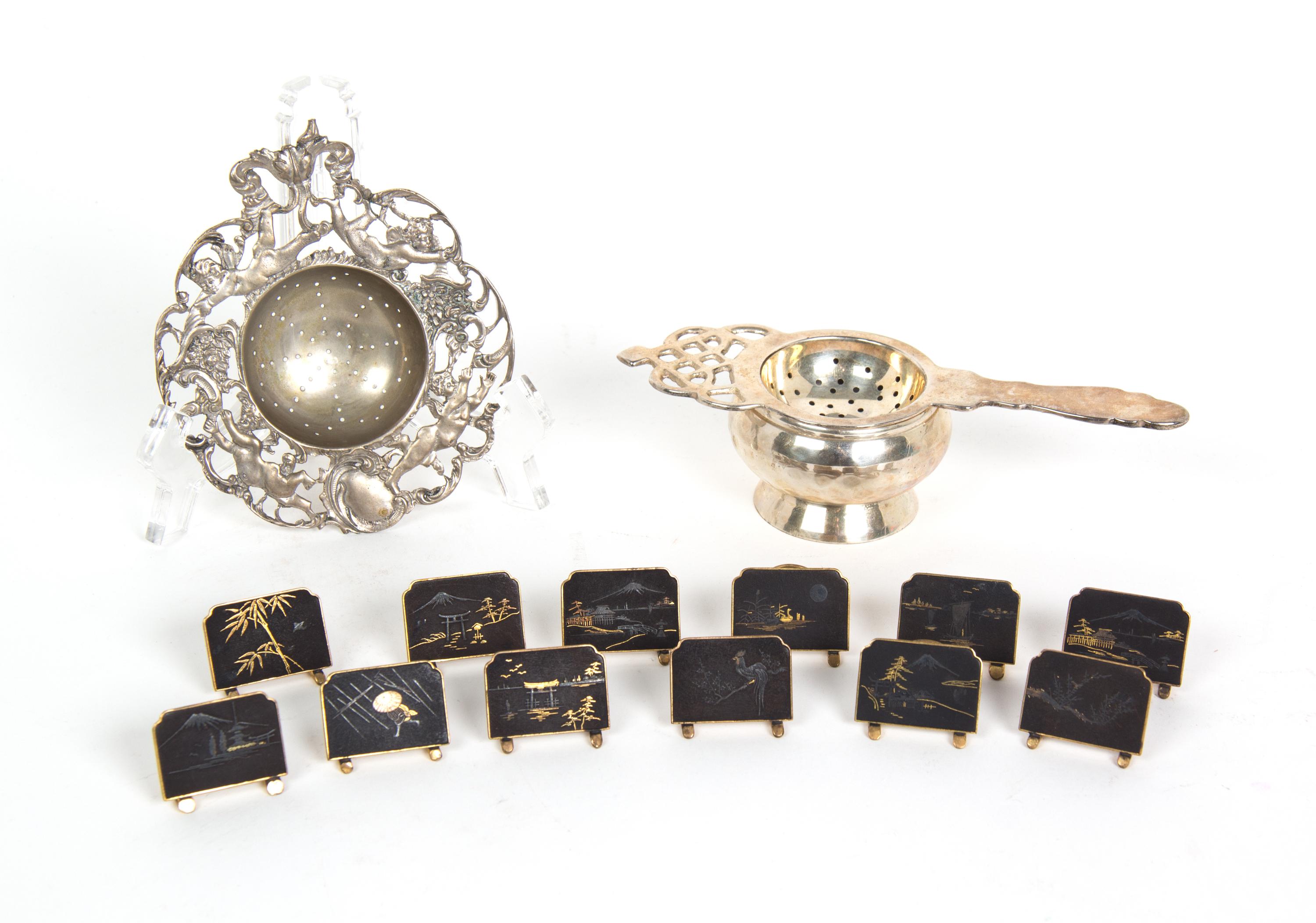Two Tea Strainers and Twelve Japanese Place Card Holders — 19TH/20TH CENTURY