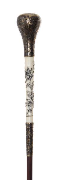 An American Silver and Japanese Ivory Handled Lady's Walking Stick, Length of handle 2 3/4 x length overall 35 1/2 inches.