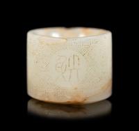 An Incised White Jade Archer's Ring