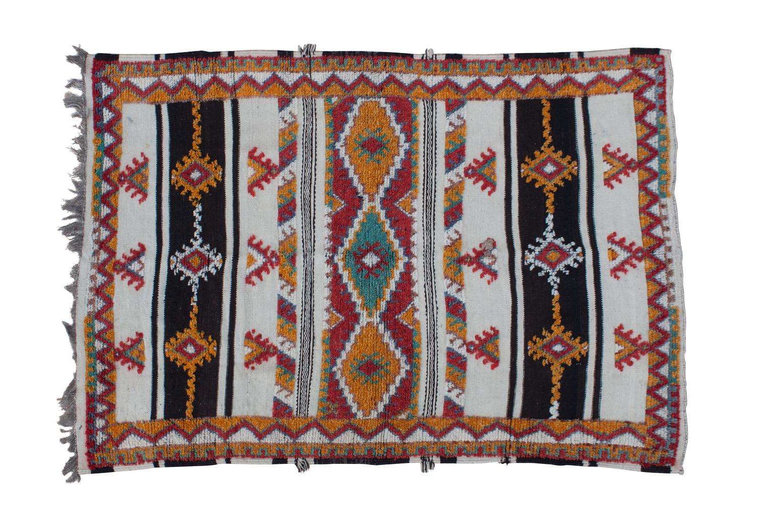 A Moroccan Wool Rug 6 feet 5 1/2 inches x 6 feet 1 inch.